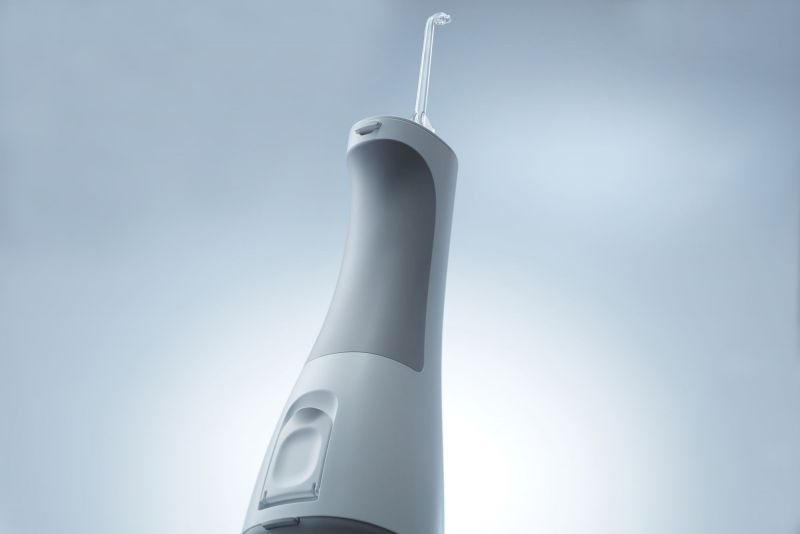 Nowy przenośny, akumulatorowy irygator jamy ustnej wykorzystujący technologię ultradźwiękową